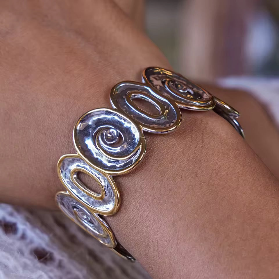 PULSERA ARO OVALADA DOBLE TONO